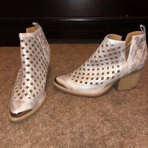 Silver booties from local boutique